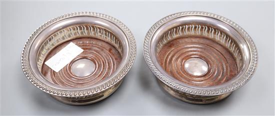 A pair of modern pierced silver wine coasters, Barker Ellis Silver Co, Birmingham, 1990, 14.6cm.